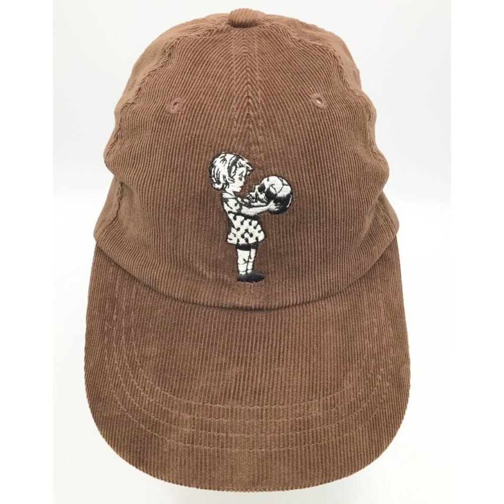 Young Girl Holding a Skull Corduroy Hat Brown Adjustable Strap Gothic Eerie Cap